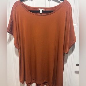 Cato Women's Short Sleeve Top in Rust (earrings)
P to P 23 inches
Length 27
